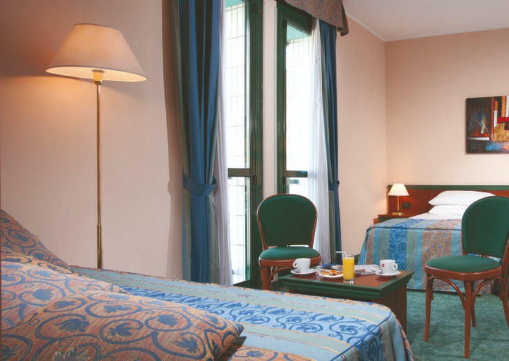 Habitación triple Hotel Raffaello Milán Habitación triple Hotel Raffaello Milán